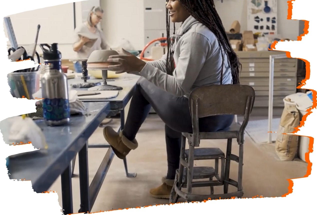 student in clay making class