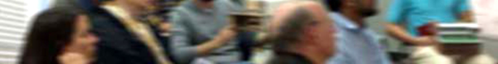 blurred banner photo of people looking to the right