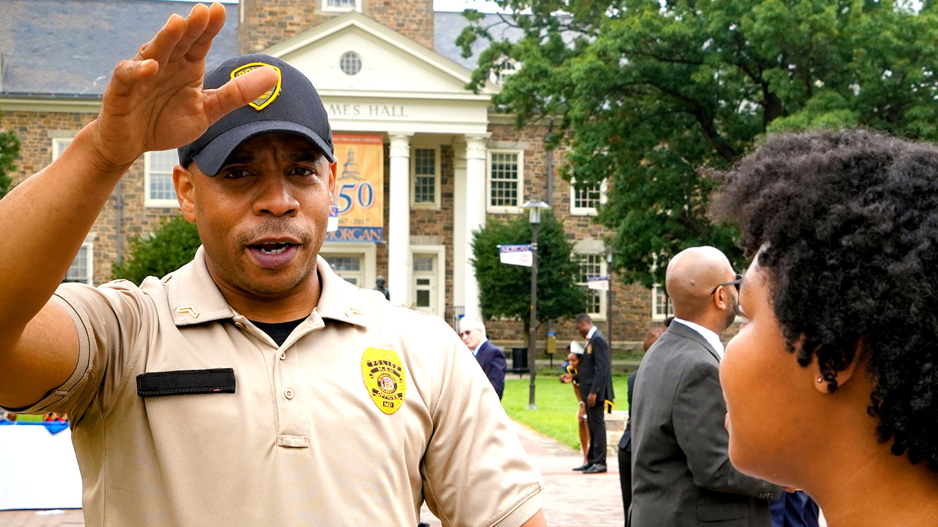 officer talking to a student