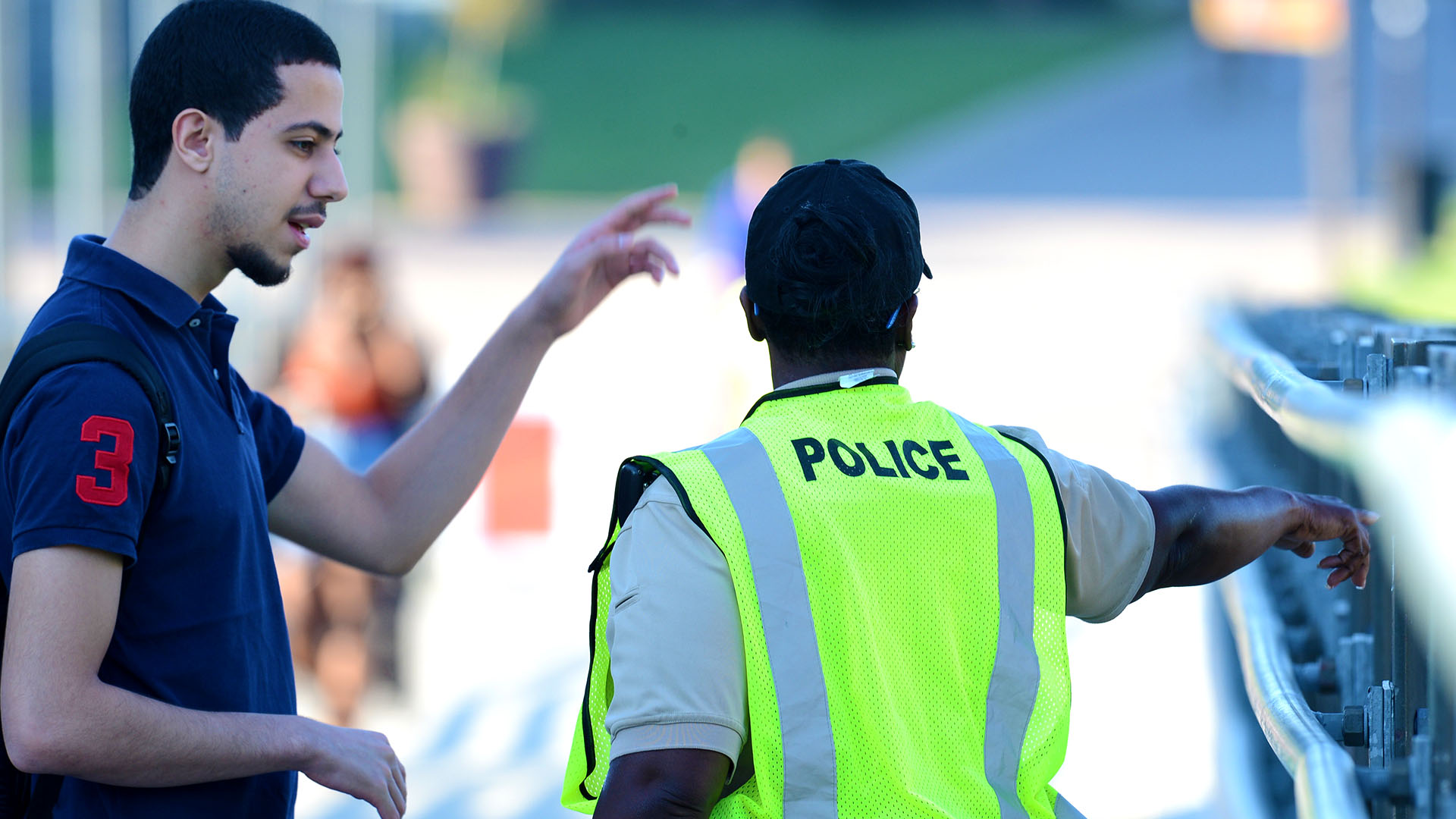 officer providing directions to a student