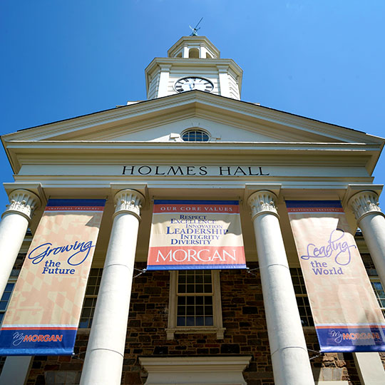 holmes hall with 3 banners displayed