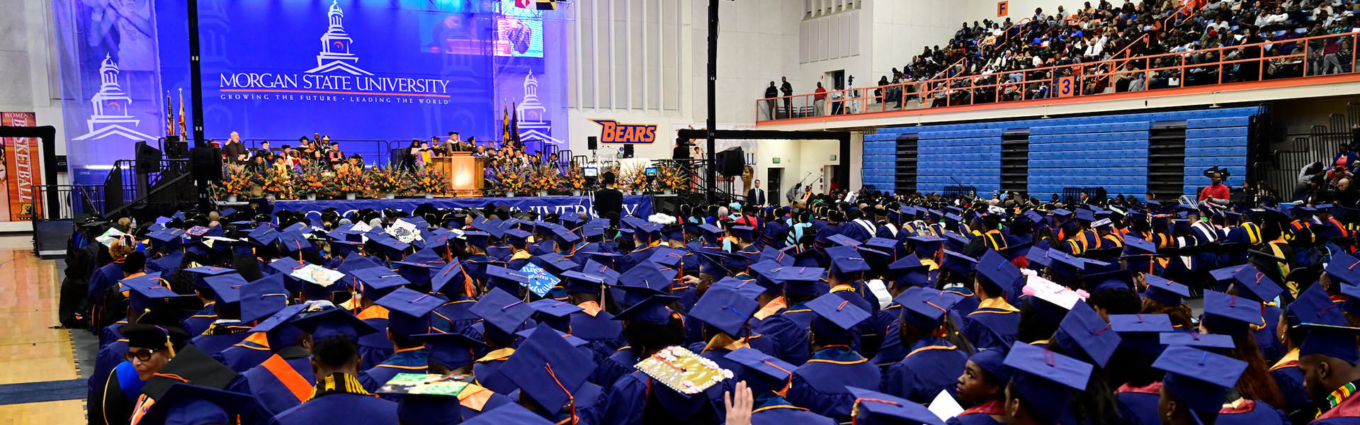 Sea of graduates at a commencement ceremony in Hill Field House