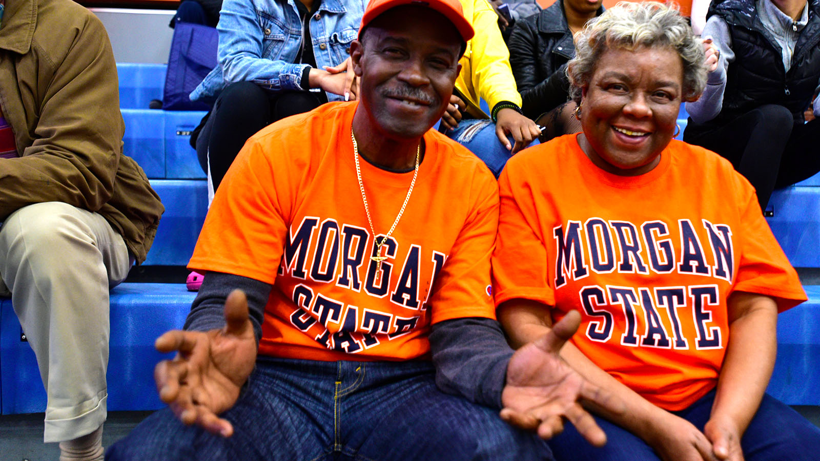 two adults wearing Morgan t-shirts