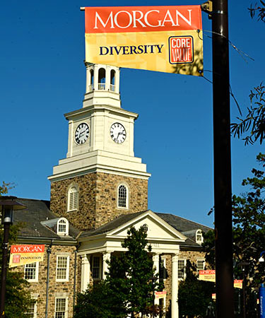 Holmes hall with Diversity and Innovation pole flags