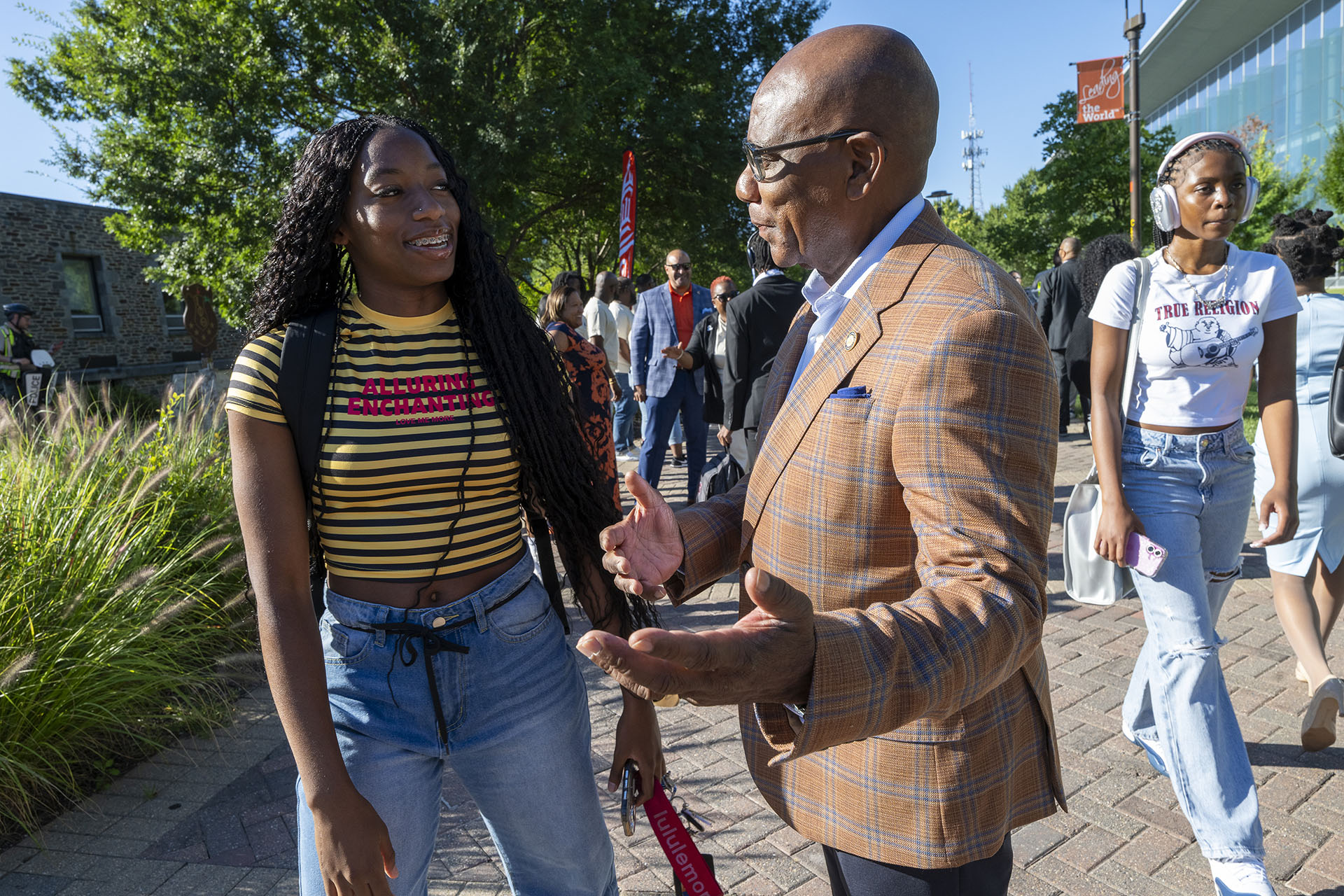 female student talking with President Wilson