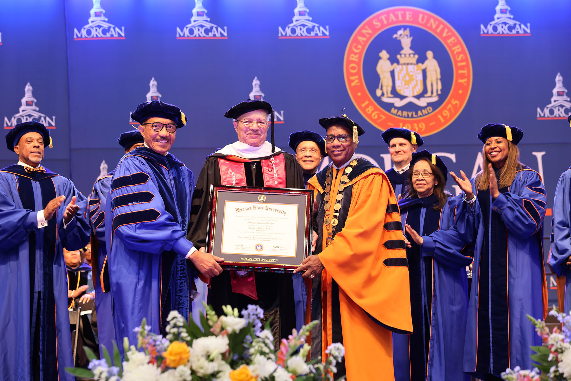 Dean Emeritus DeWayne Wickham, founding dean of Morgan&rsquo;s School of Global Journalism and Communication (SGJC), conferred with an Honorary Doctor of Humane Letters degree.