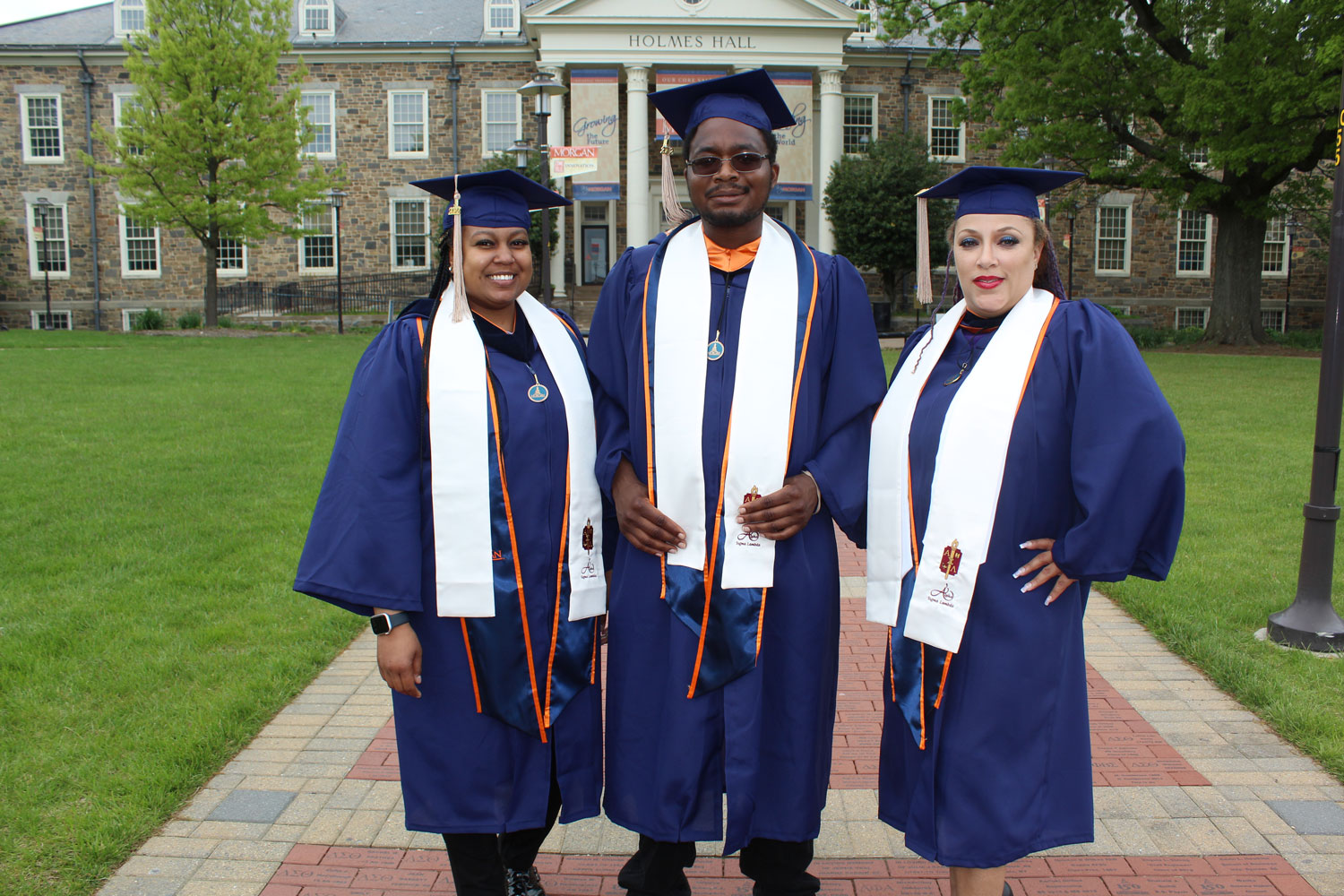 Adult learner graduates and members of the Alpha Sigma Lambda Honor Society.