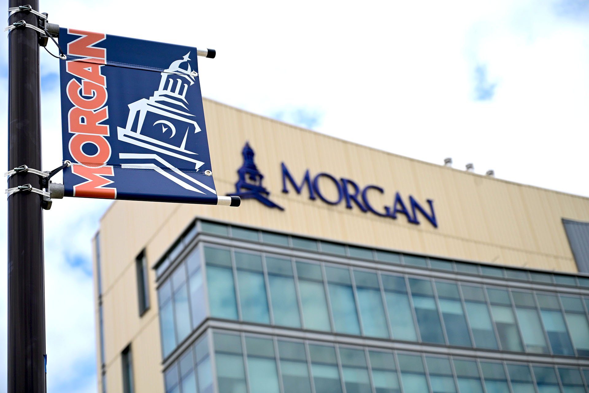 Morgan flag on pole against background of Jenkins Hall