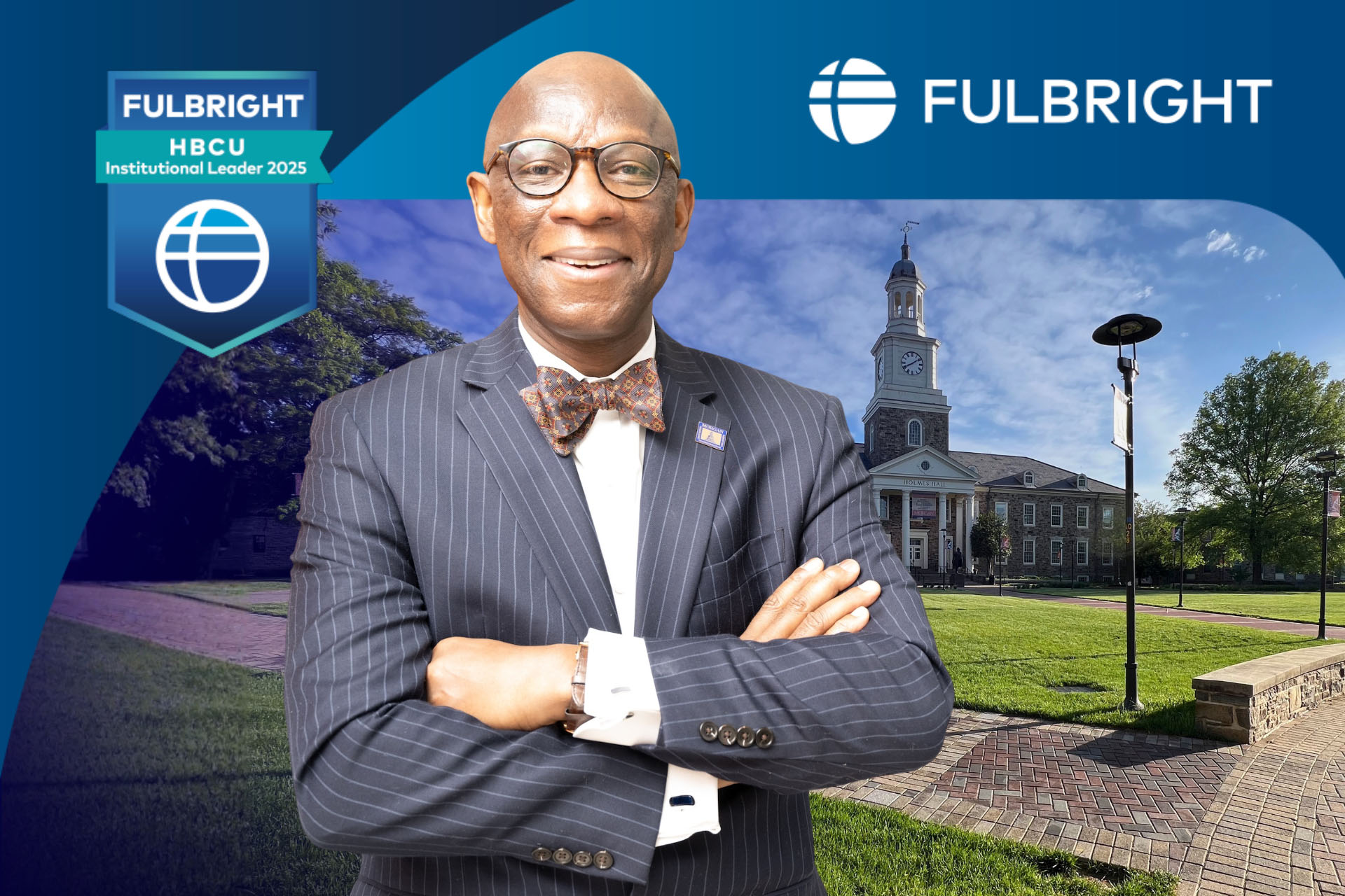Dean Oscar Barton standing against backdrop of Holmes Hall with Fulbright 2025 badge