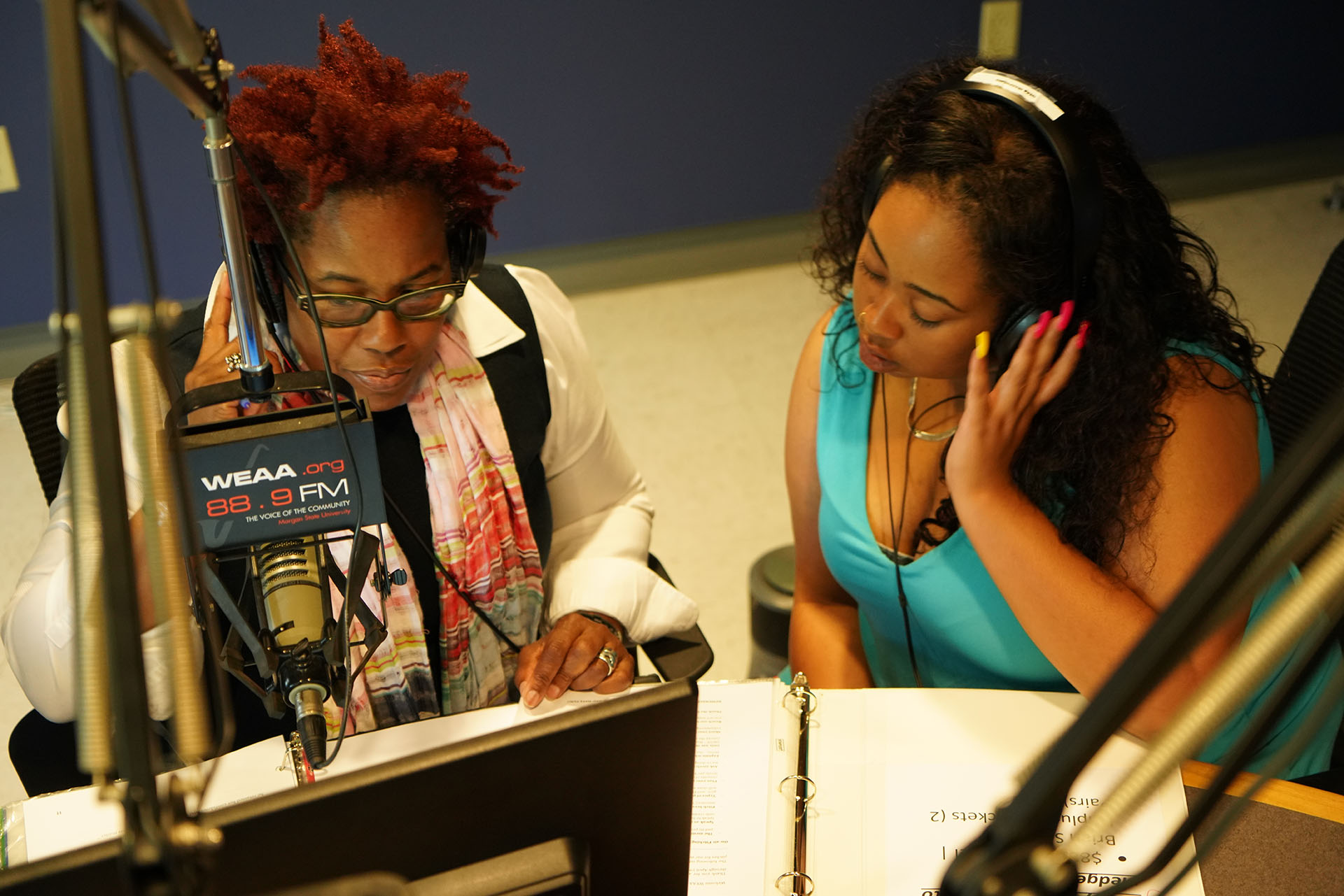 Dr. Kaye on the mic along with a student