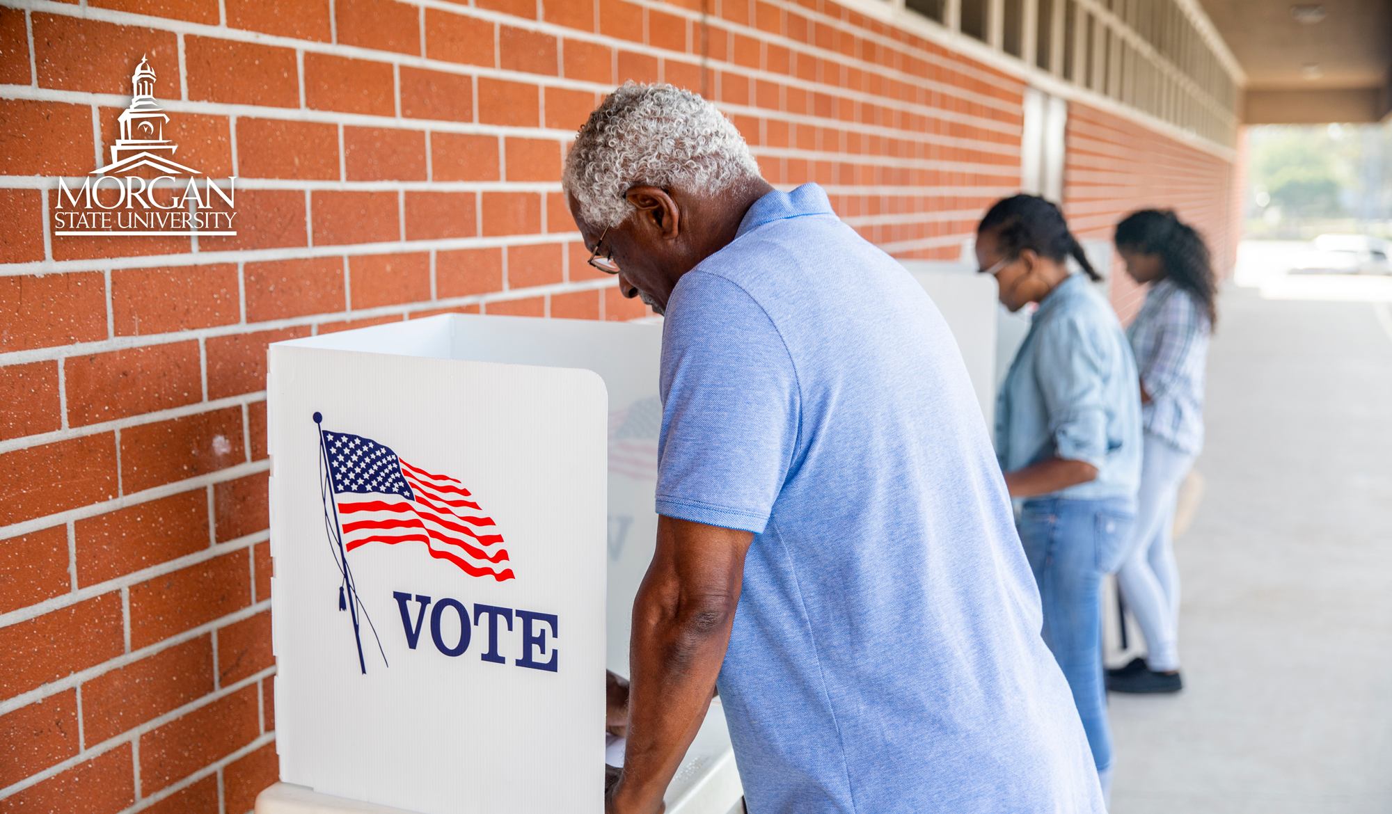 people at the voting booth