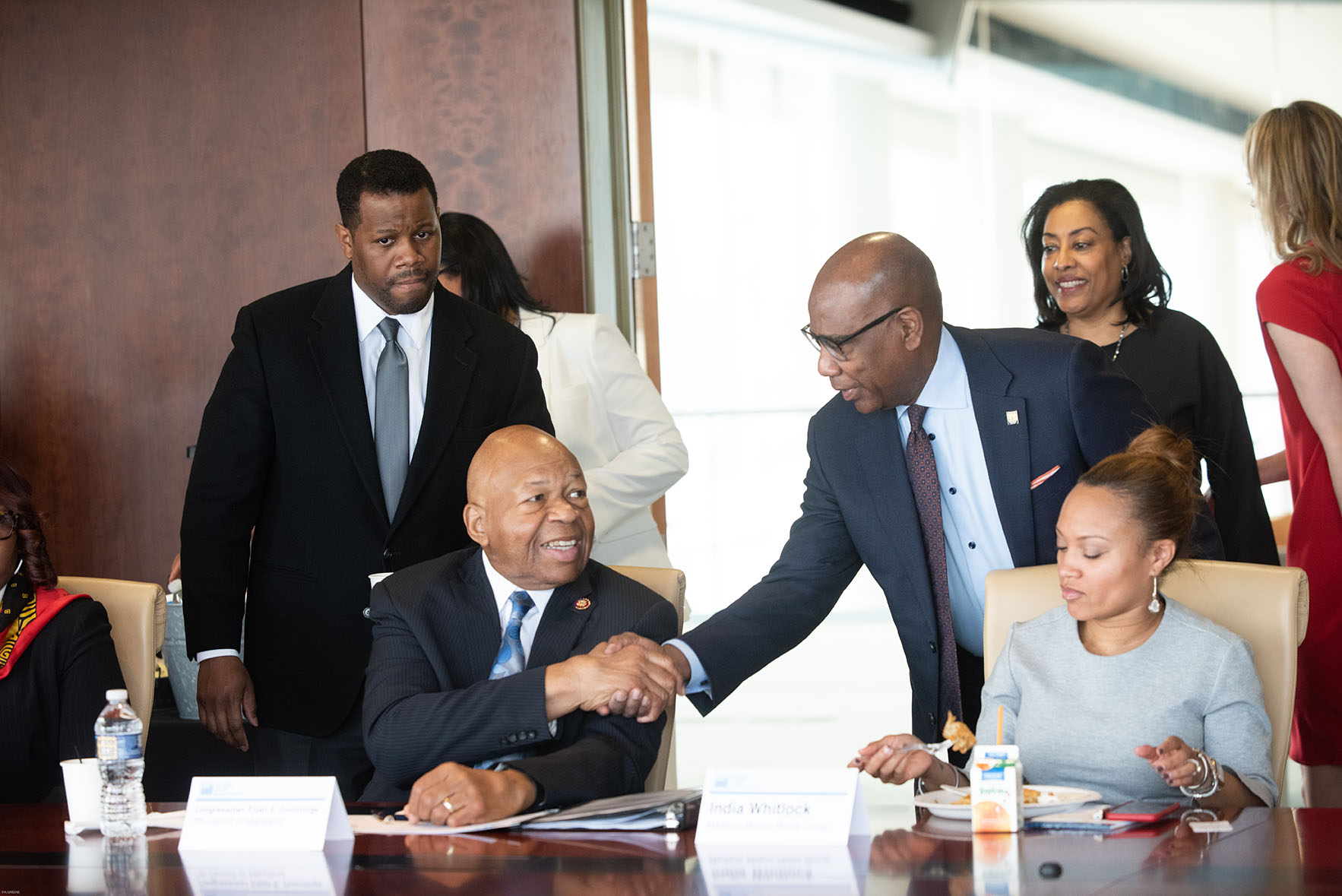 President Wilson shaking hands with Congressman Elijah Cummings
