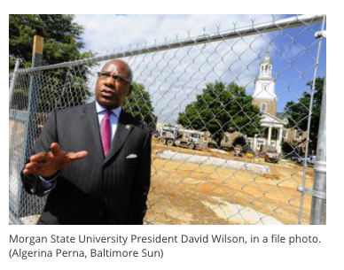 Wilson talking at construction site