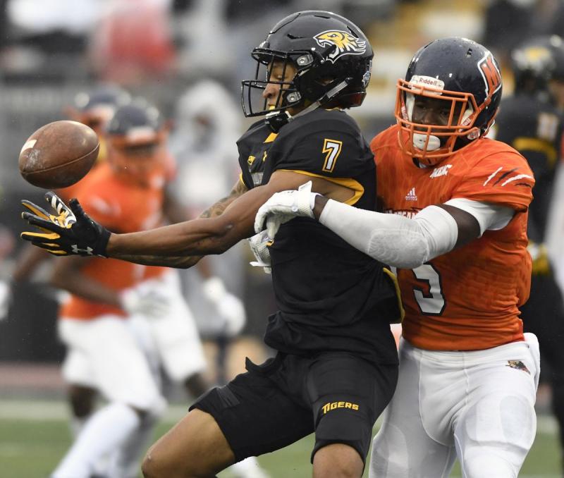 Morgan and Towson football players