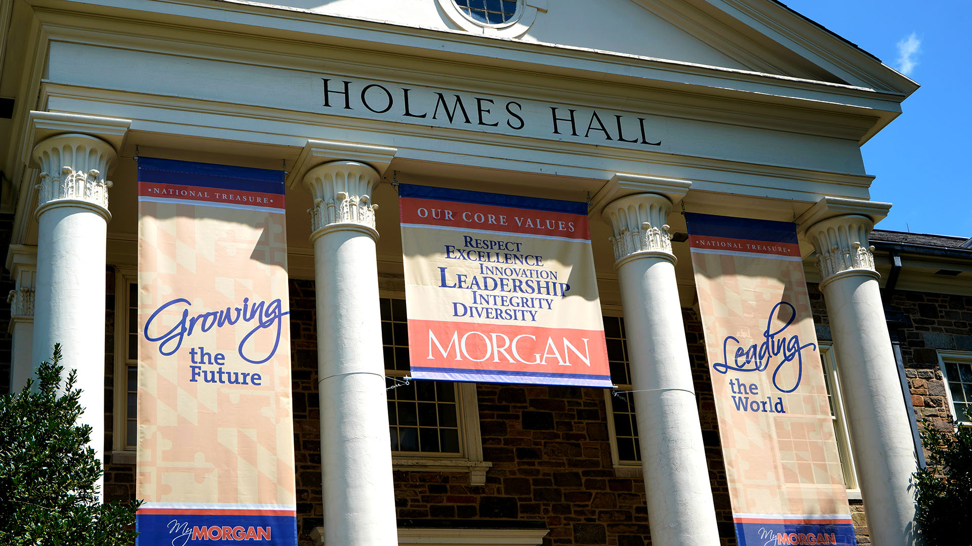 Holmes Hall with 3 banners